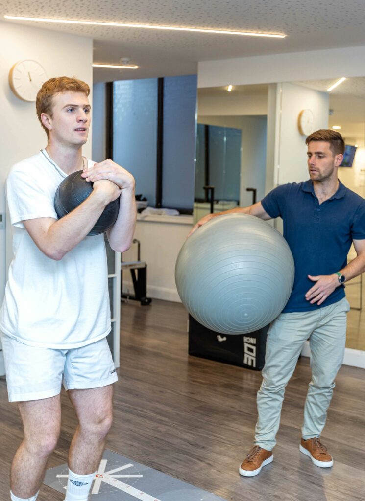 Make patient completing rehab exercise with ball